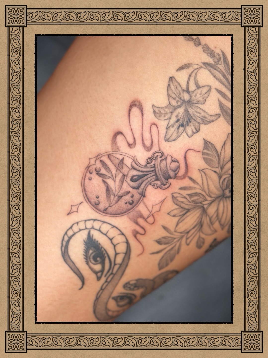 Vial with hand dotwork tattoo on the shoulder by Eddie
