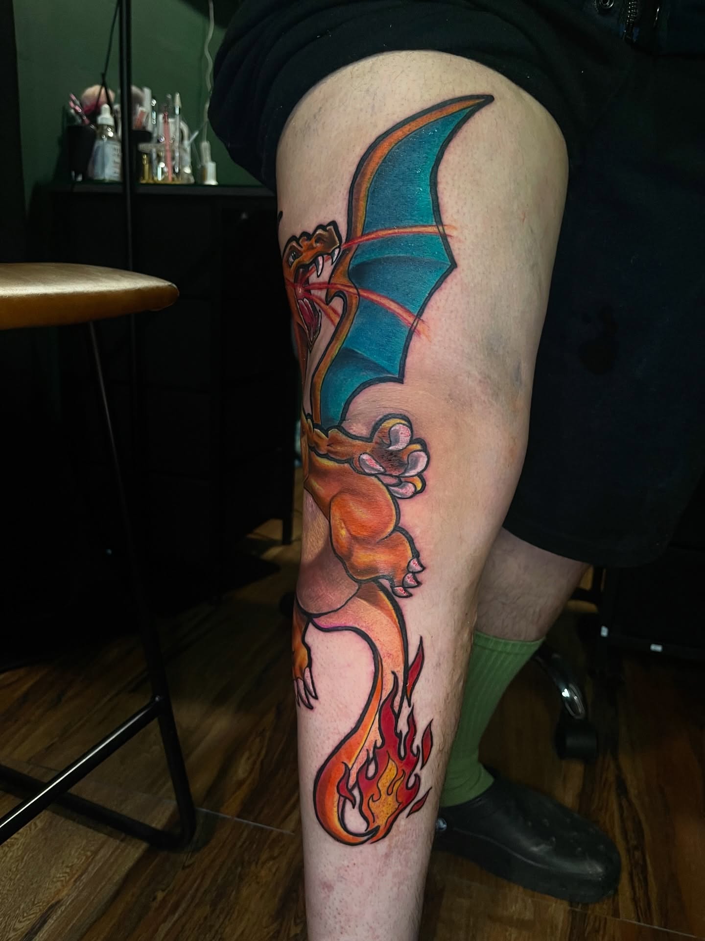 Dragon new school tattoo on the thigh by Monstro Ink Arts Tattoos, Bakersfield, California