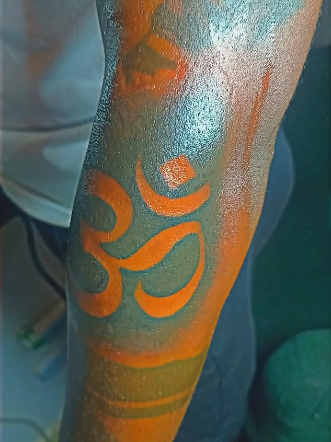 Om symbol geometric tattoo on the forearm by Mwangaza Bodyworks, Uthiru, Nairobi Area, Kenya