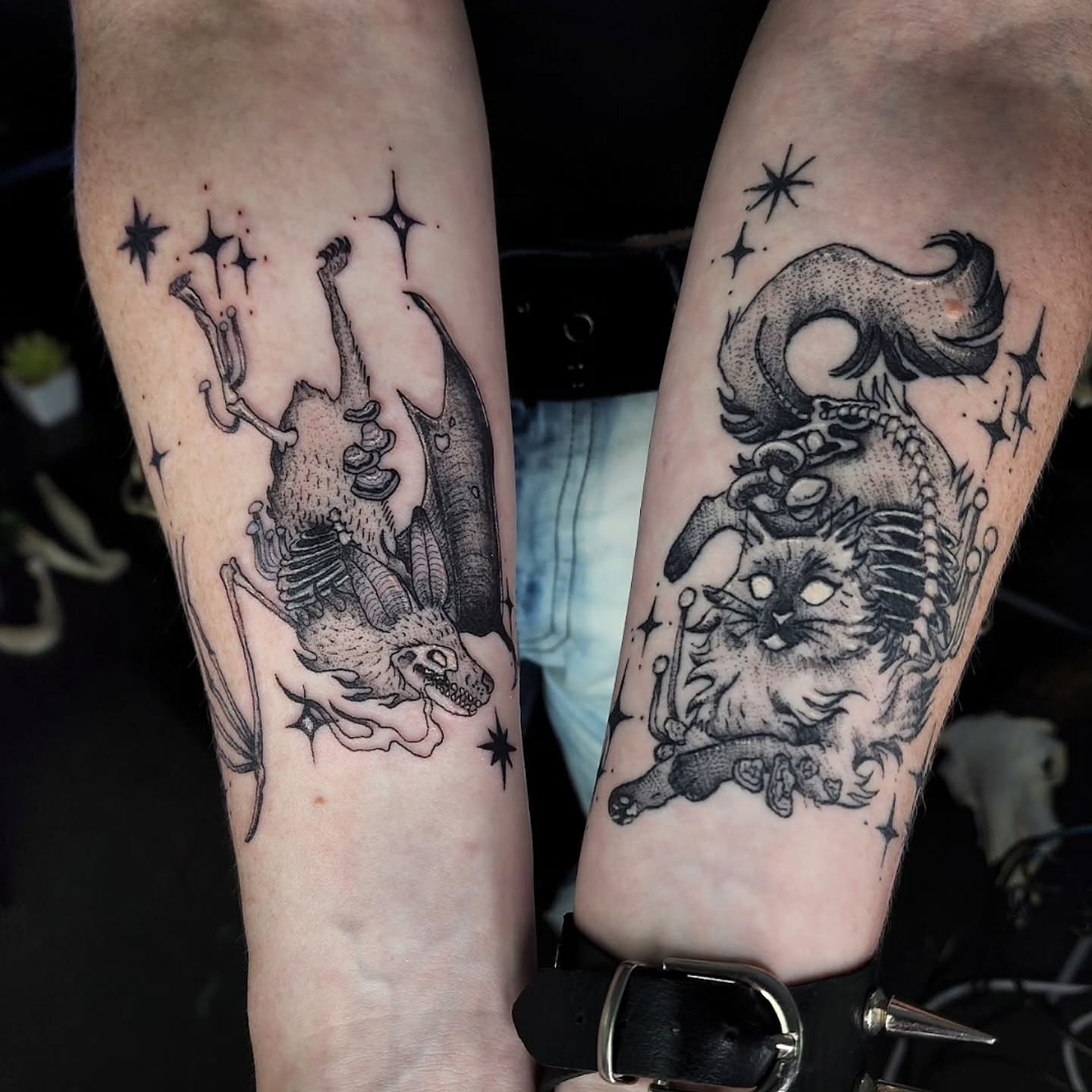 Dragon and cat dotwork tattoo on the forearm by julian