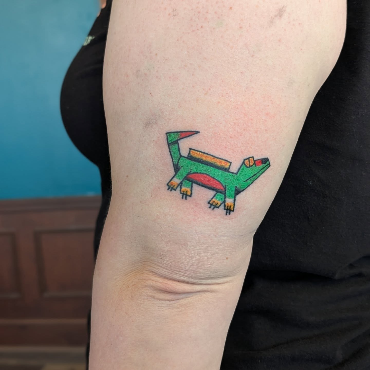 Dachshund geometric tattoo on the forearm by Jon Sedor