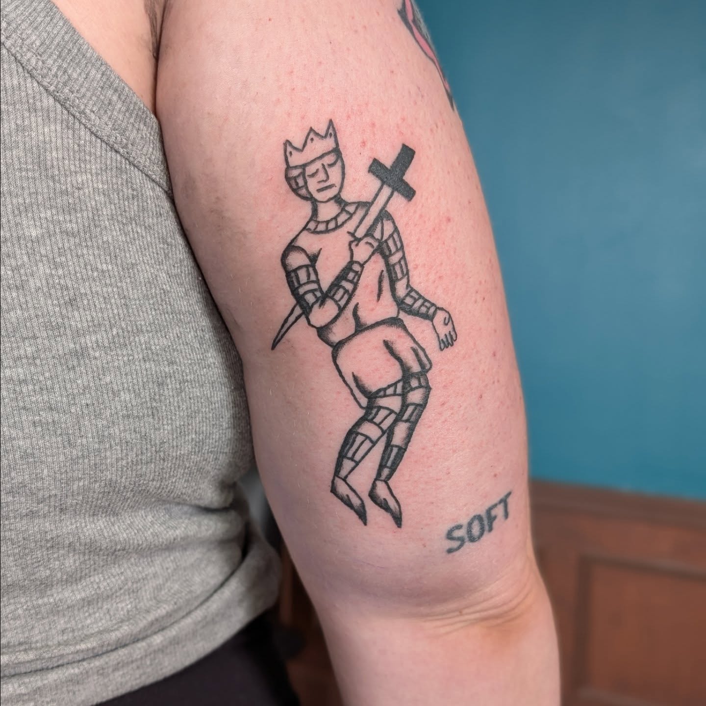 King with cross black and grey tattoo on the forearm by Jon Sedor