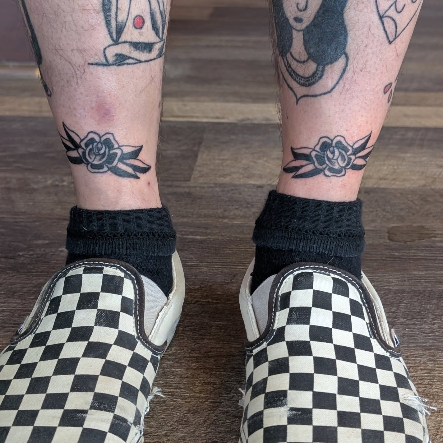 Roses American traditional tattoo on the leg by Jon Sedor