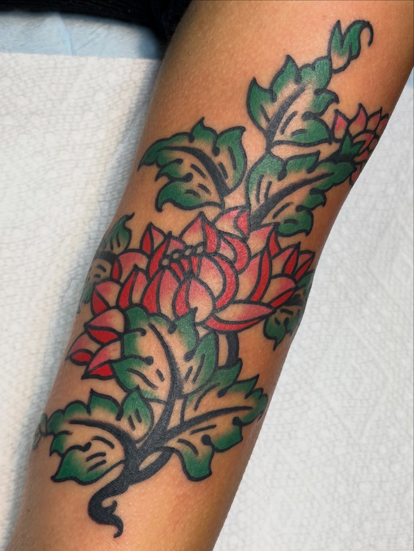 Lotus flowers American traditional tattoo on the forearm by 🌈KNOXVILLE’S FAVORITE TATTOO ARTIST 👽 마법 버섯