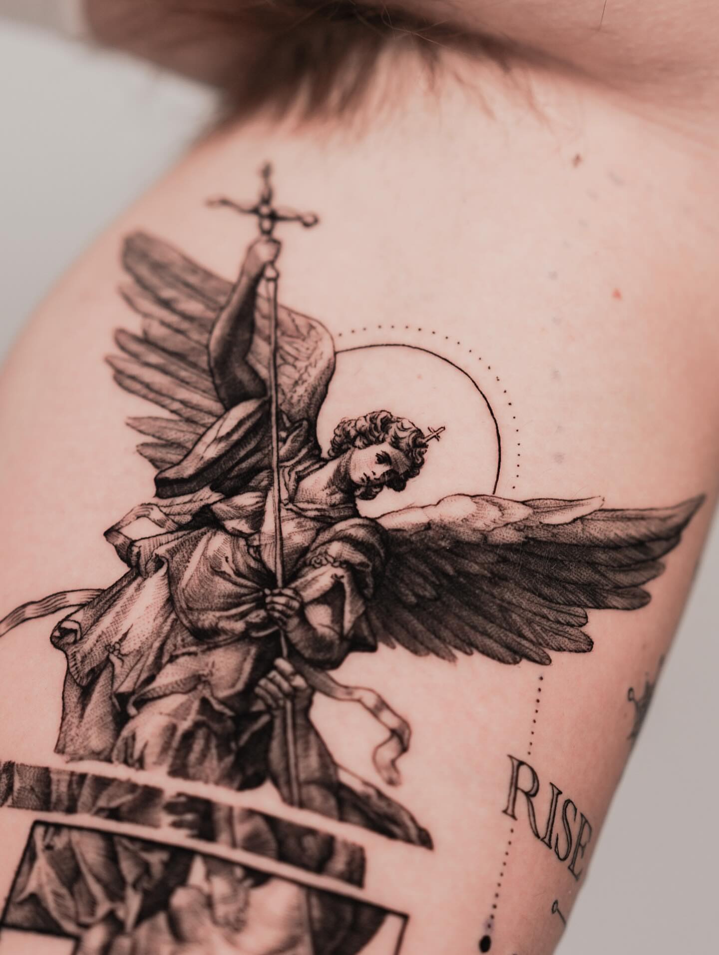 Angel with sword realism tattoo on the shoulder by Jinzhi ye