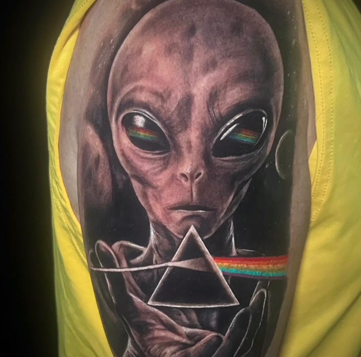 Alien realism tattoo on the forearm by Dustin Kaiser, Mentor, Ohio