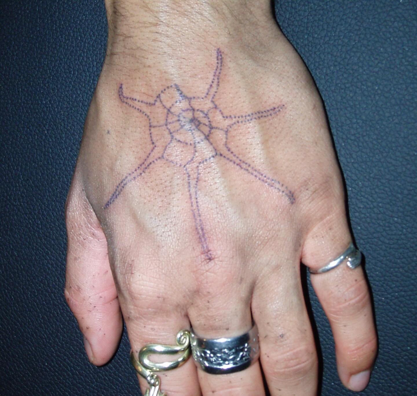 Geometric design geometric tattoo on the hand by kari