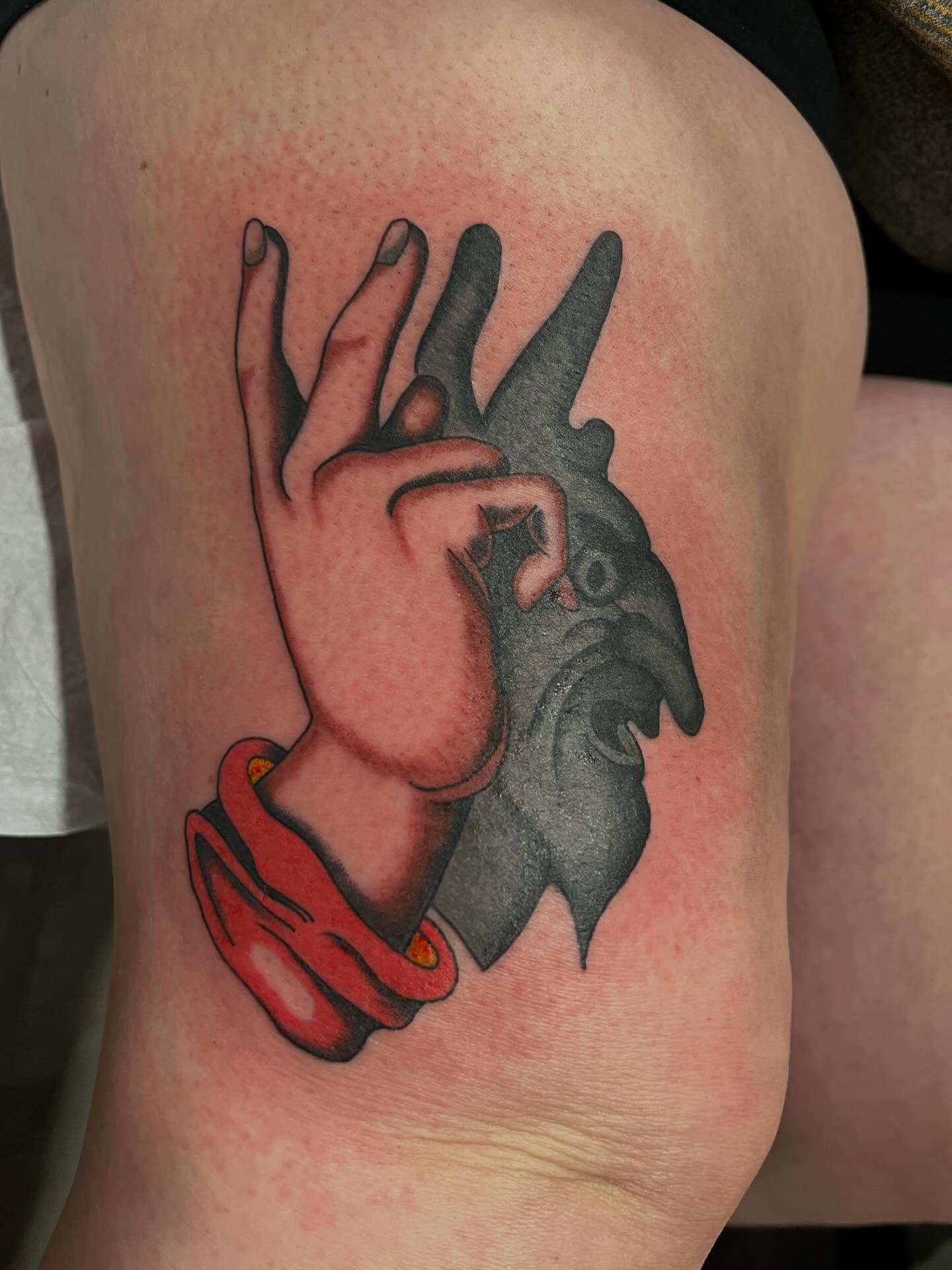 Heart with hand American traditional tattoo on the thigh by P R O P H e T T R A V I S