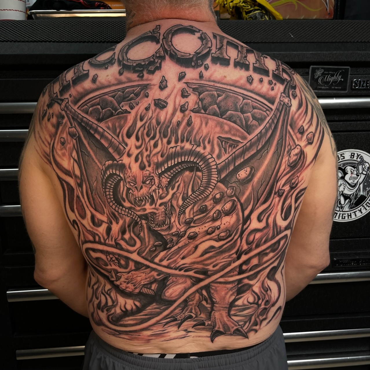 Demon dark realism tattoo on the back by Gary Chase