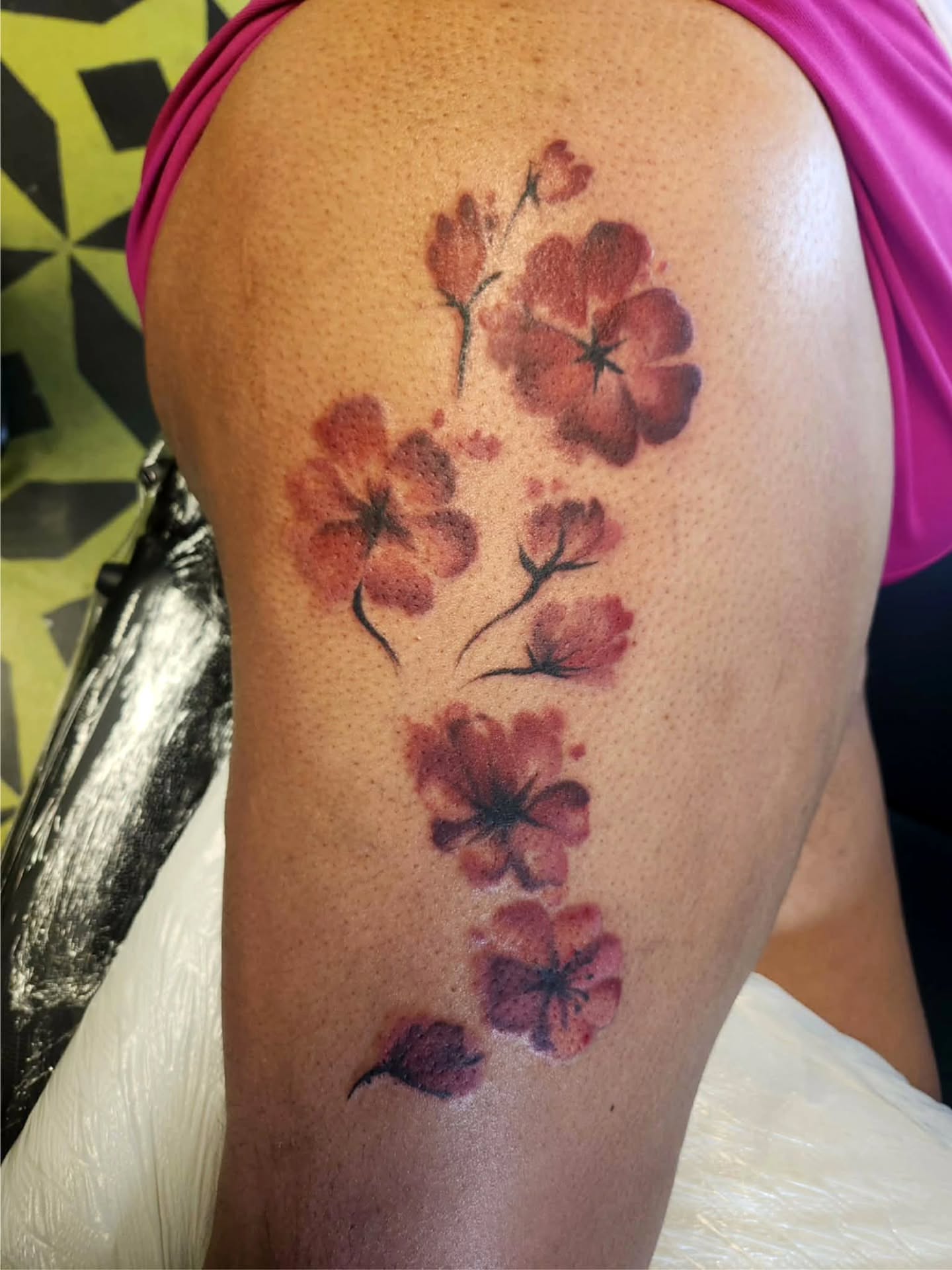 Cherry blossoms watercolor tattoo on the shoulder by Heather
