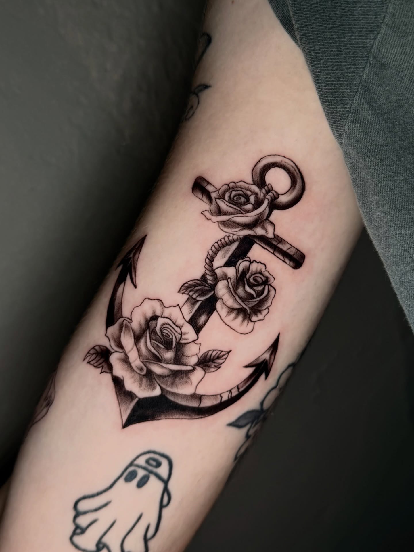 Anchor with roses black and grey tattoo on the forearm by jayla pantig