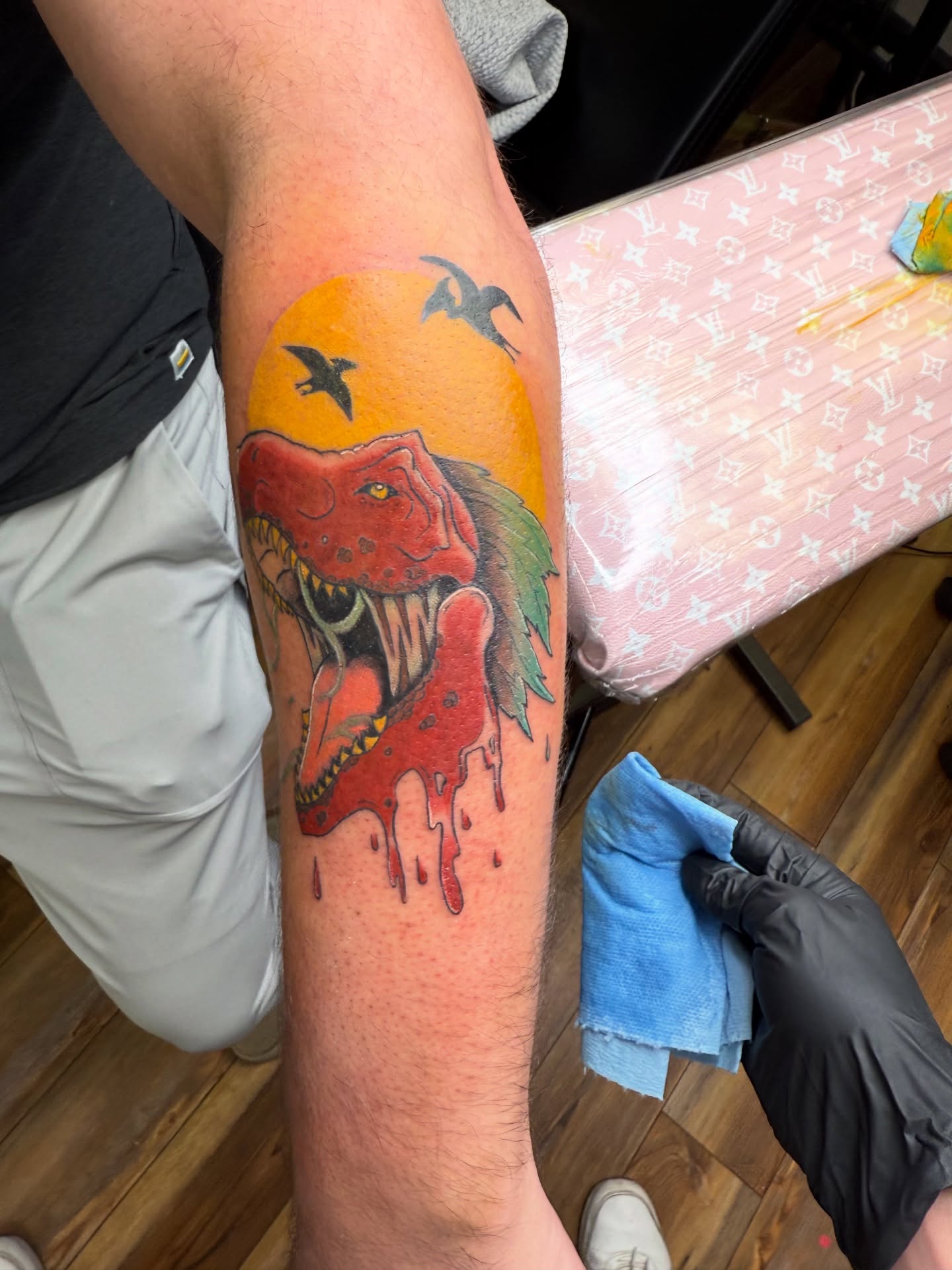 Dinosaur realism tattoo on the forearm by Palmer Andrist🩸Fort Collins Tattoo Apprentice