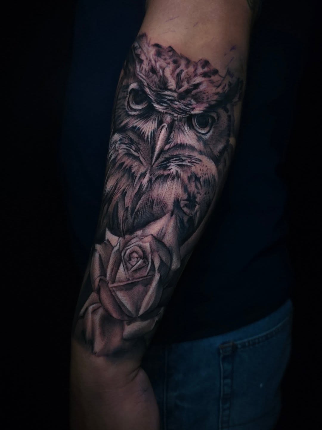 Owl and rose realism tattoo on the forearm by Joseph J Tattooart Denver, Lakewood, Colorado