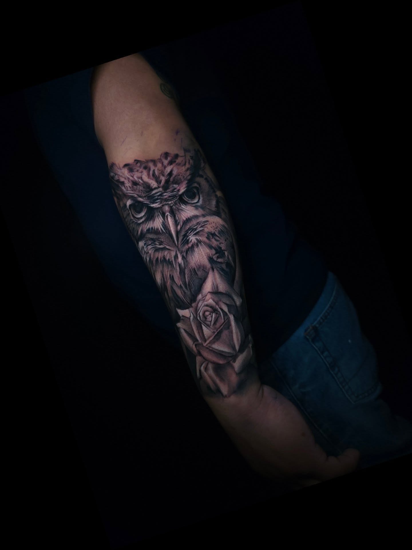 Owl and rose realism tattoo on the forearm by Joseph J Tattooart Denver, Lakewood, Colorado