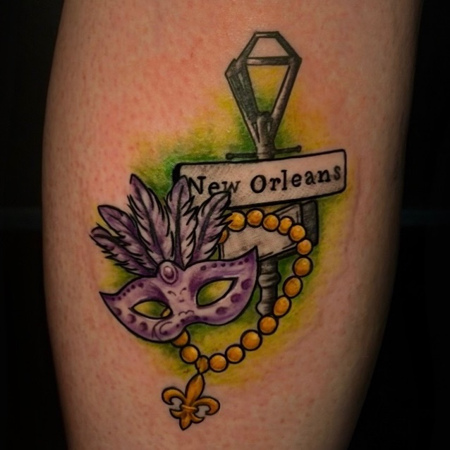 Masquerade mask American traditional tattoo on the forearm by Blair The Artist!