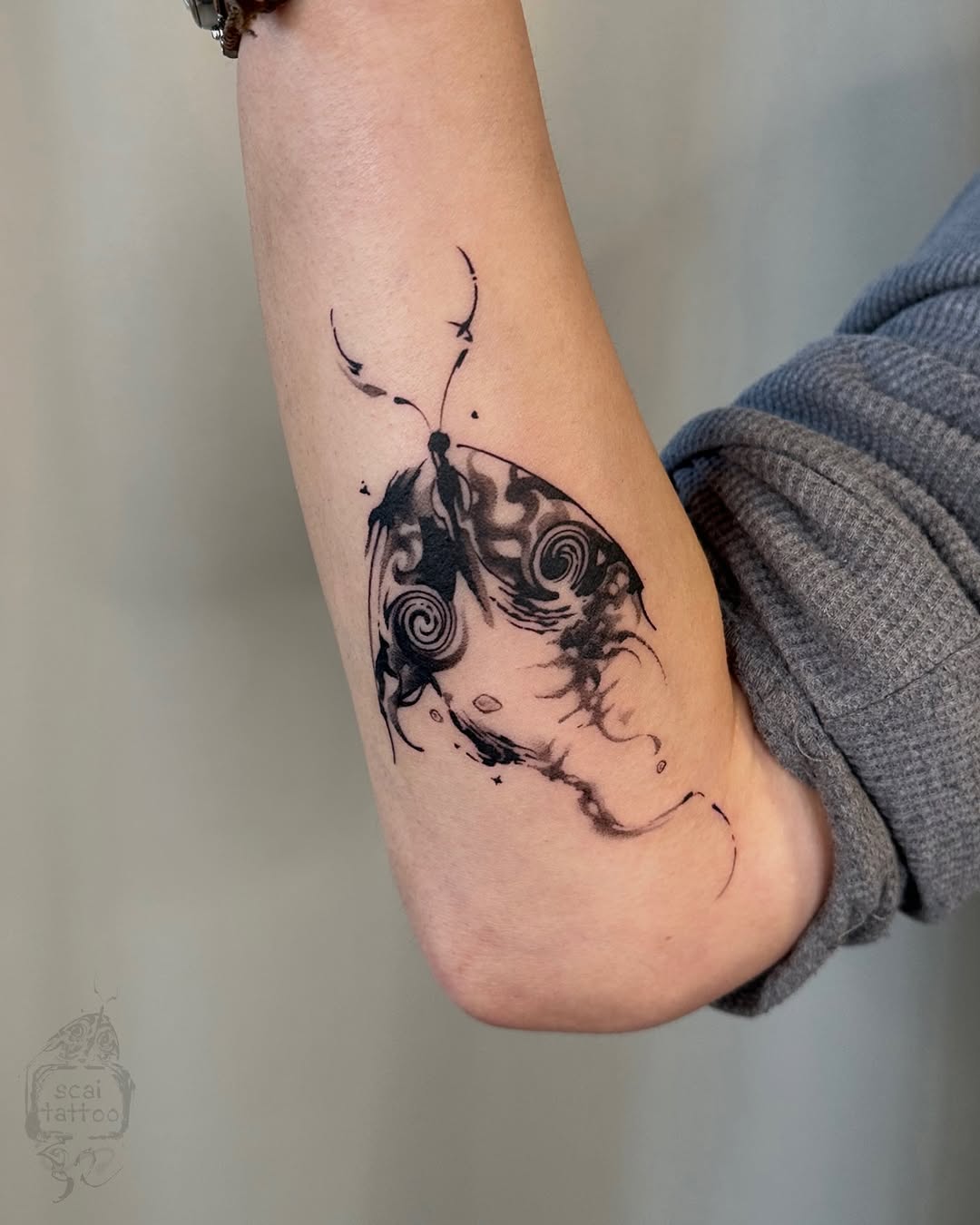 Moth fine line tattoo on the forearm by scaitattoo