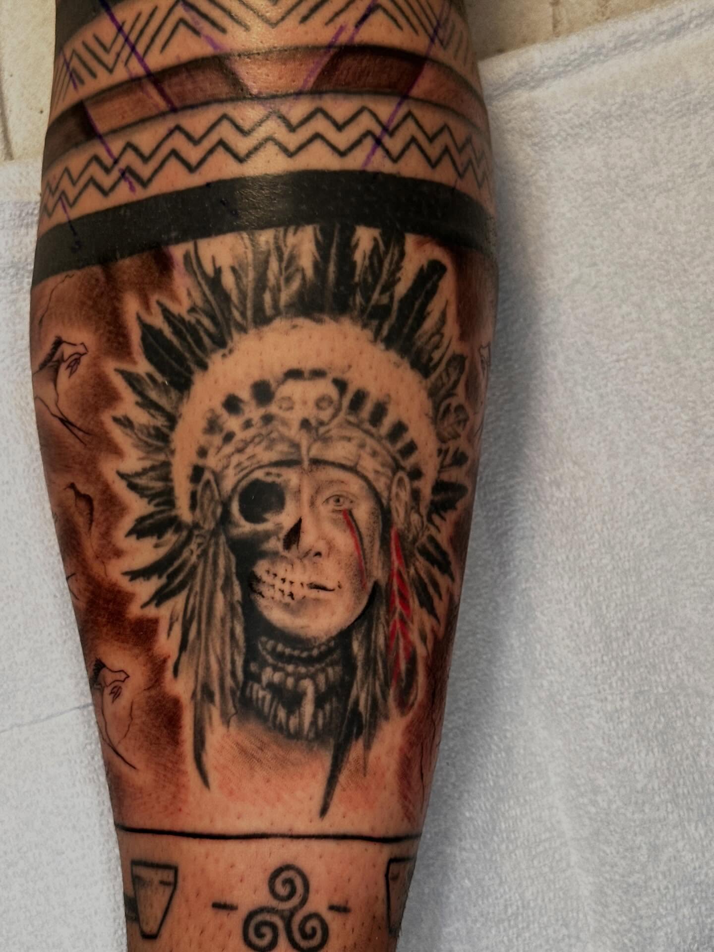 Indian chief skull realism tattoo on the forearm by James Nelson