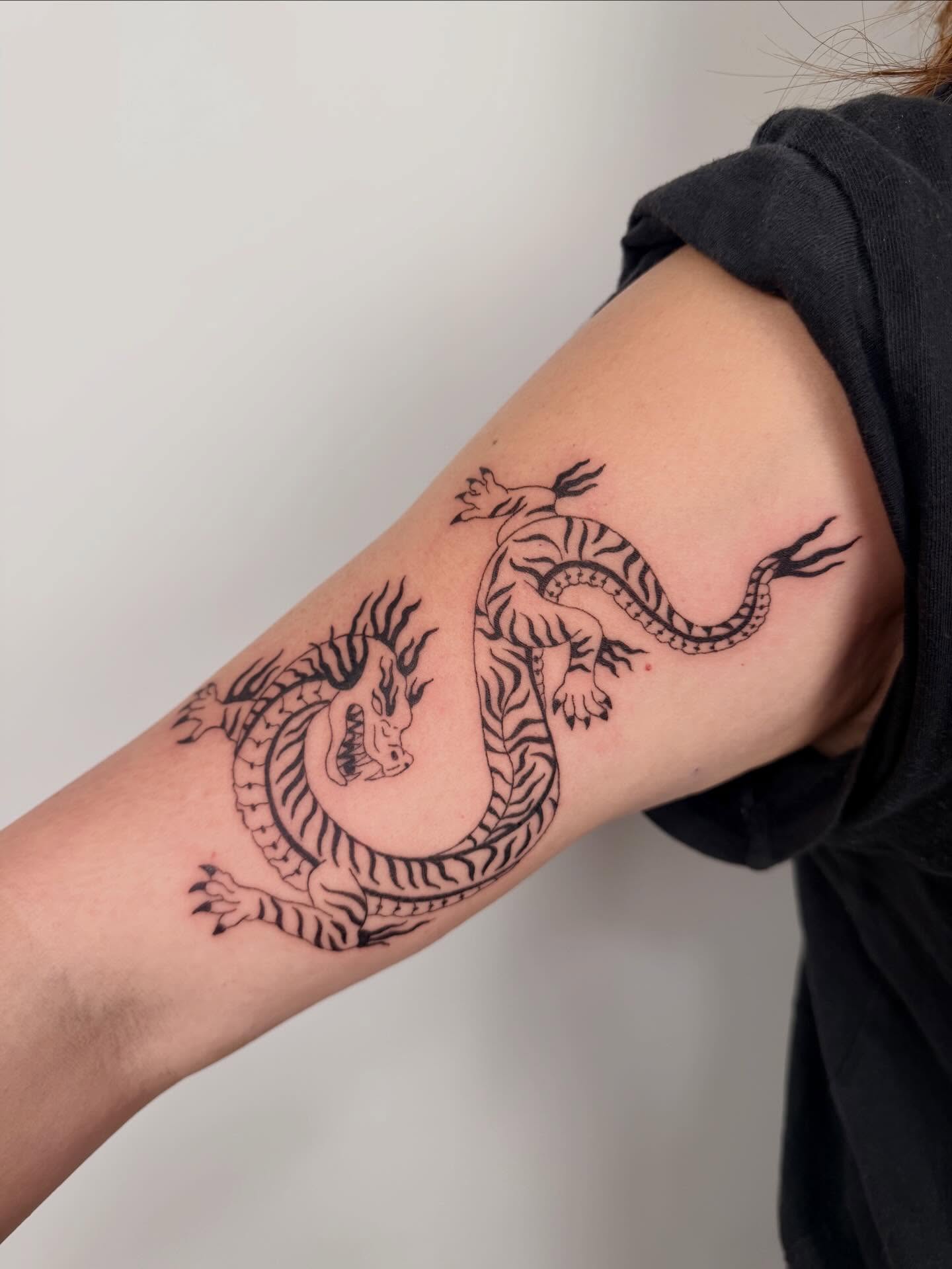Dragon black and grey tattoo on the forearm by b i l l i e, Seattle, Washington