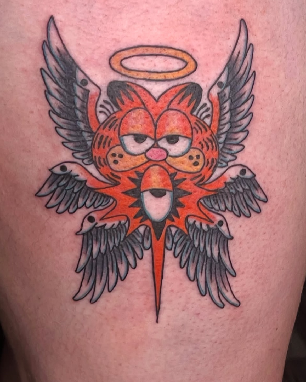 Angry cat American traditional tattoo on the thigh by Rachel Hanke