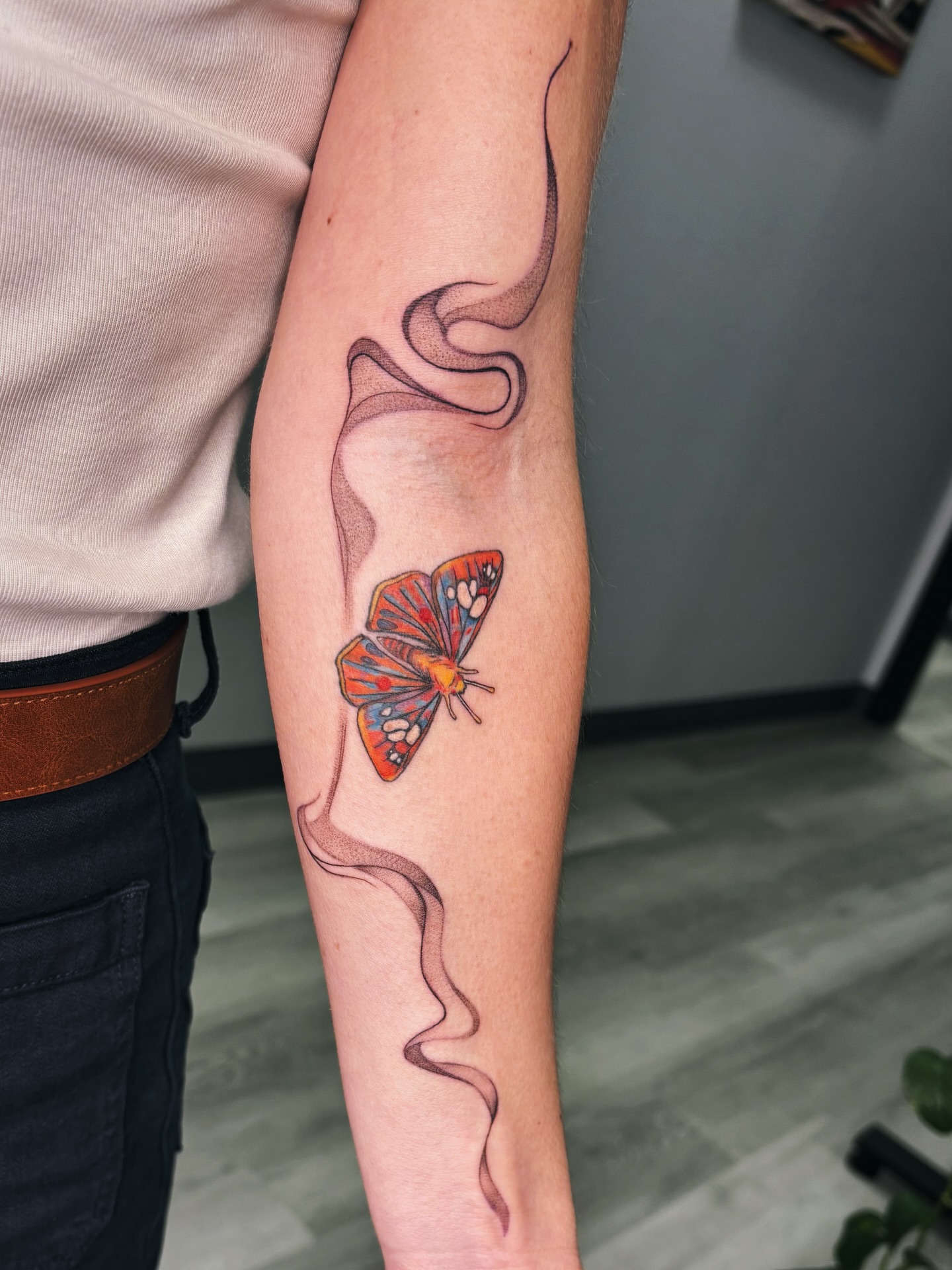 Butterfly realism tattoo on the forearm by Alexandria Gudiel