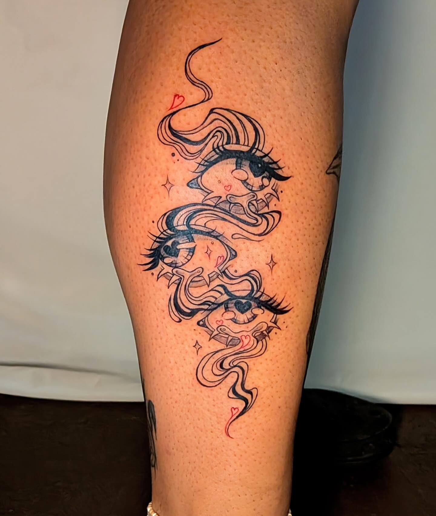 Smoking woman illustrative tattoo on the thigh by Shannon