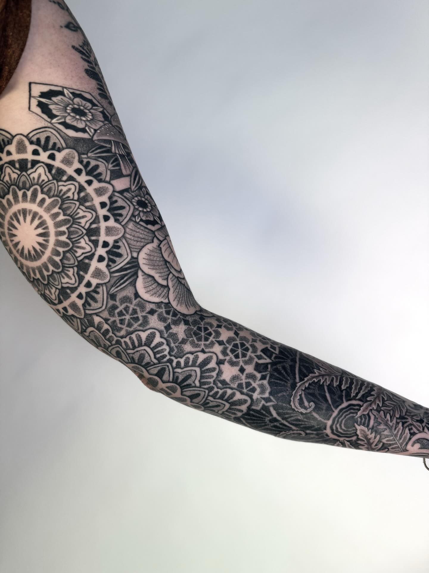 Floral mandala ornamental tattoo on the forearm by Jamie Beach, Wheat Ridge, Colorado