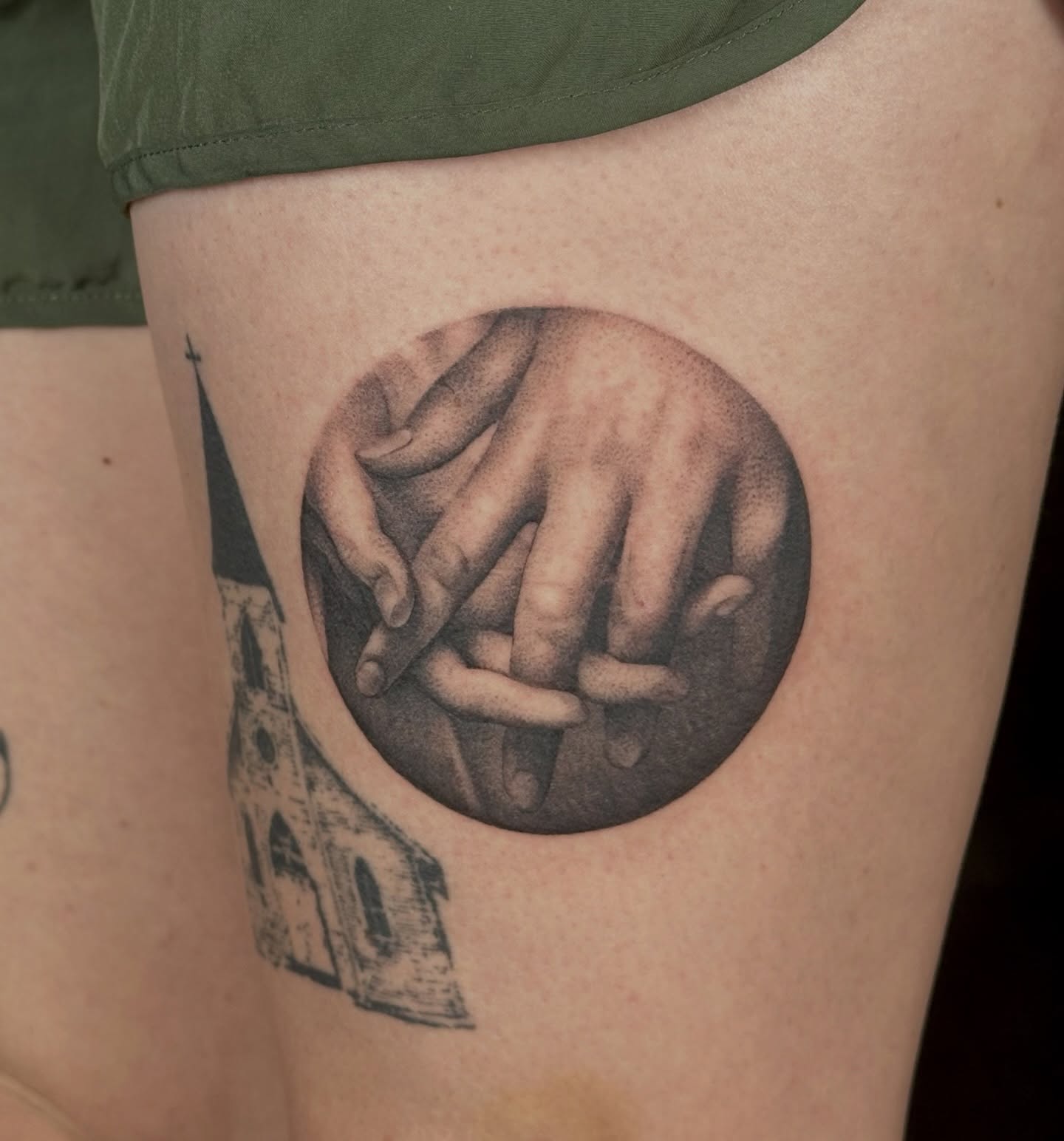 Hands dotwork tattoo on the thigh by Zoe Arrigo