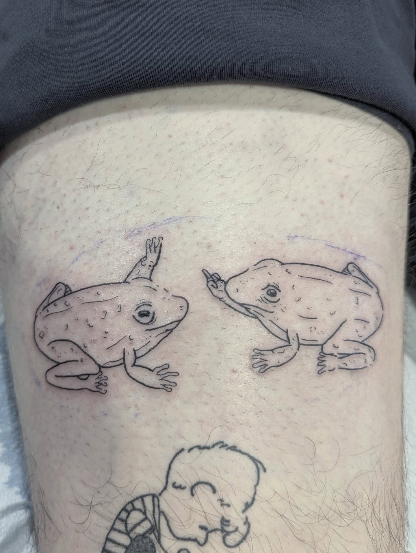 Frogs black and grey tattoo on the thigh by Patricio