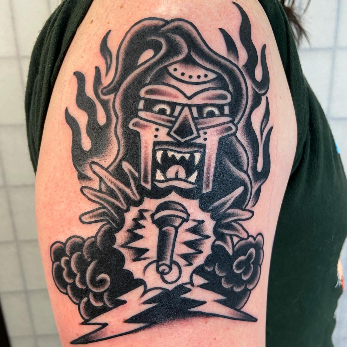 Warrior helmet American traditional tattoo on the shoulder by Anthony Jaeger, Seattle, Washington