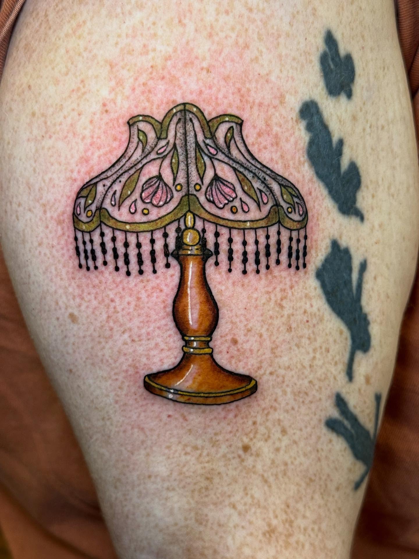 Lampshade ornamental tattoo on the thigh by Max
