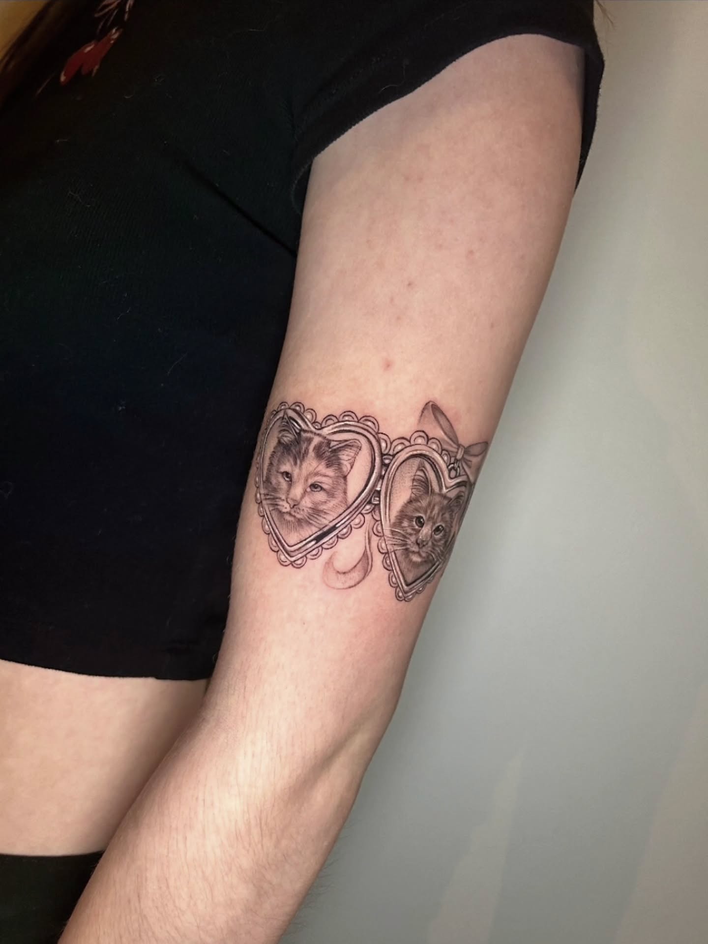 Cat mirror realism tattoo on the forearm by Lynx, Cincinnati, Ohio