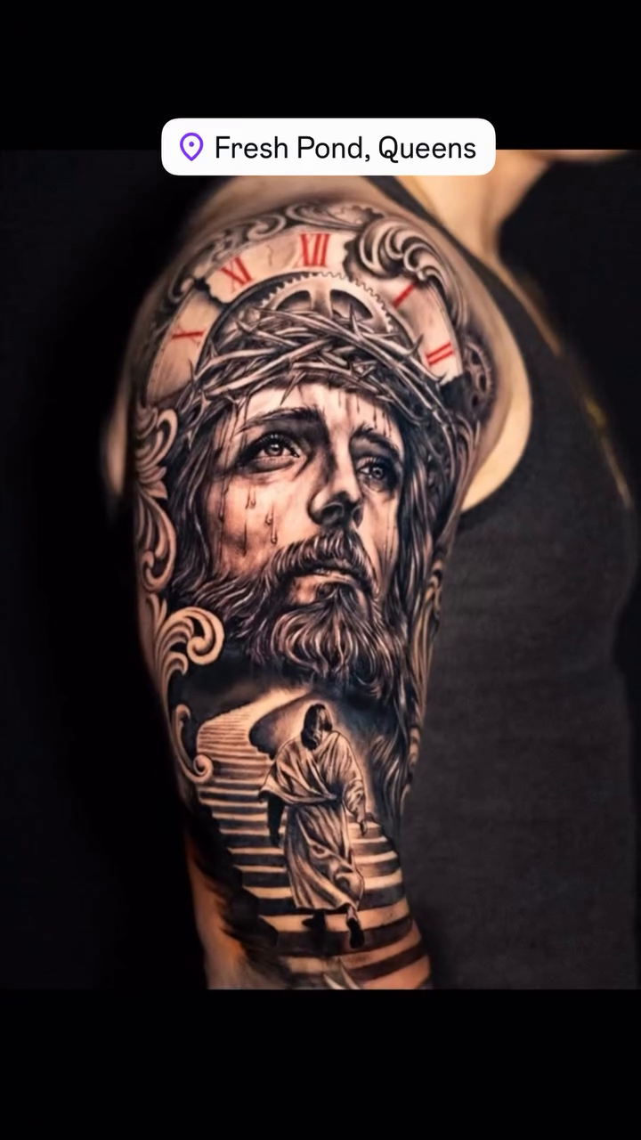 Jesus christ and crown of thorns realism tattoo on the upper arm by James Jurado