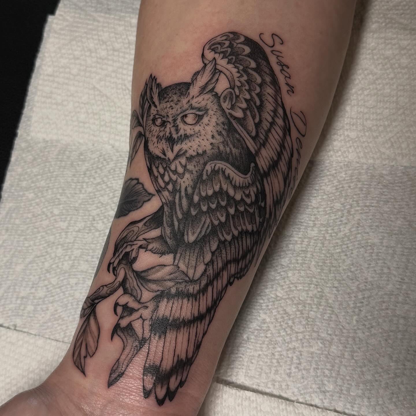 Owl black and grey tattoo on the forearm by Sophia, New Carlisle, Ohio
