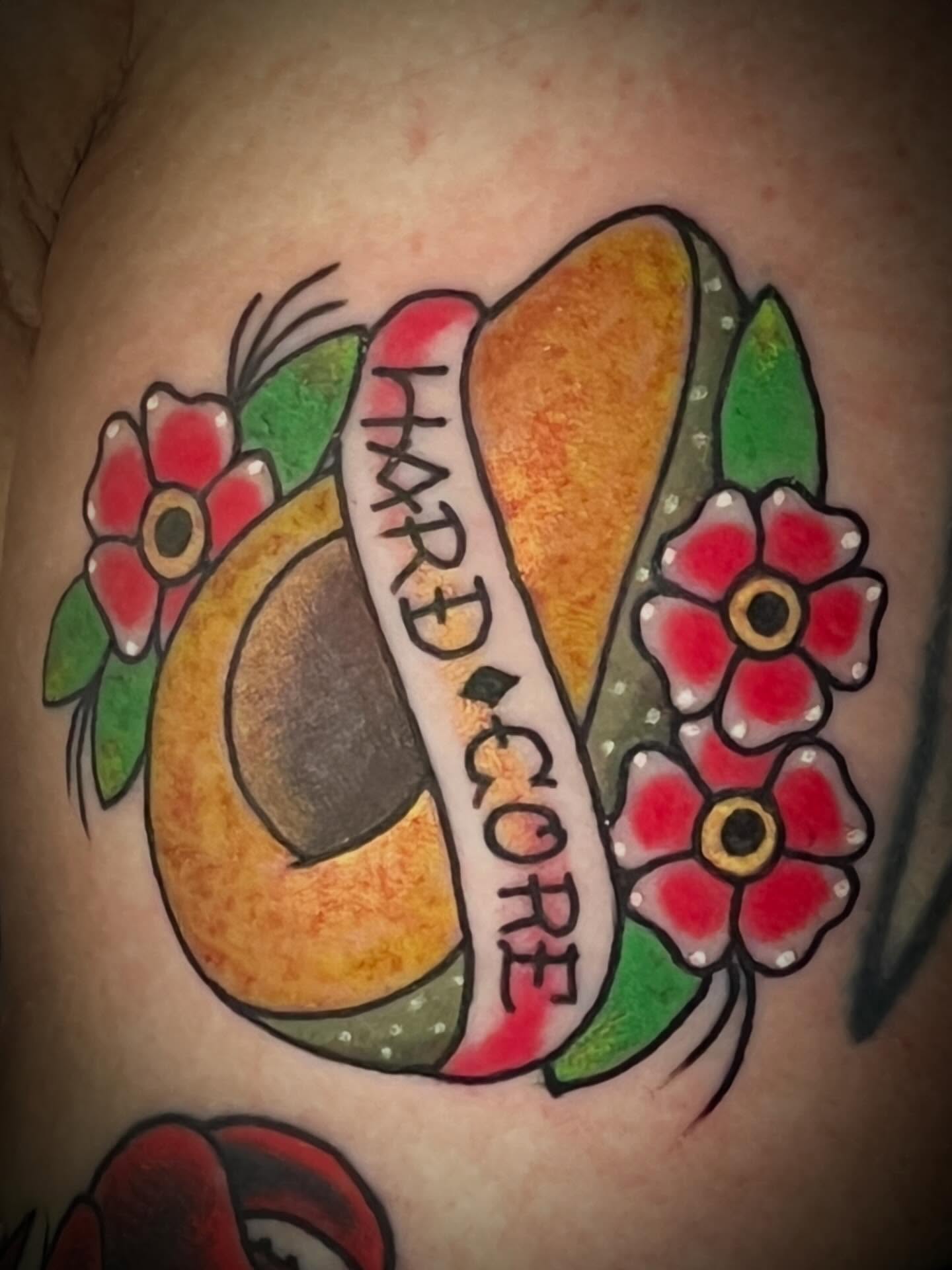 Hot dog American traditional tattoo on the shoulder by Suzanne B