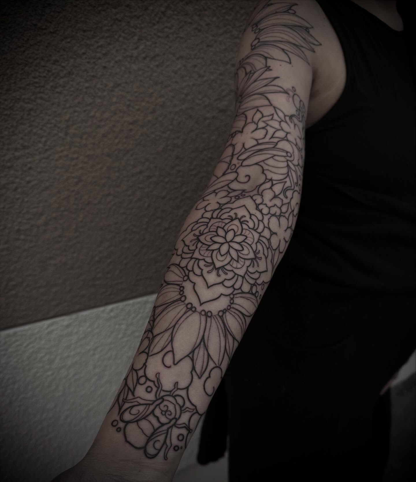 Floral bouquet black and grey tattoo on the forearm by M A R I B e T H▪️k L A A R