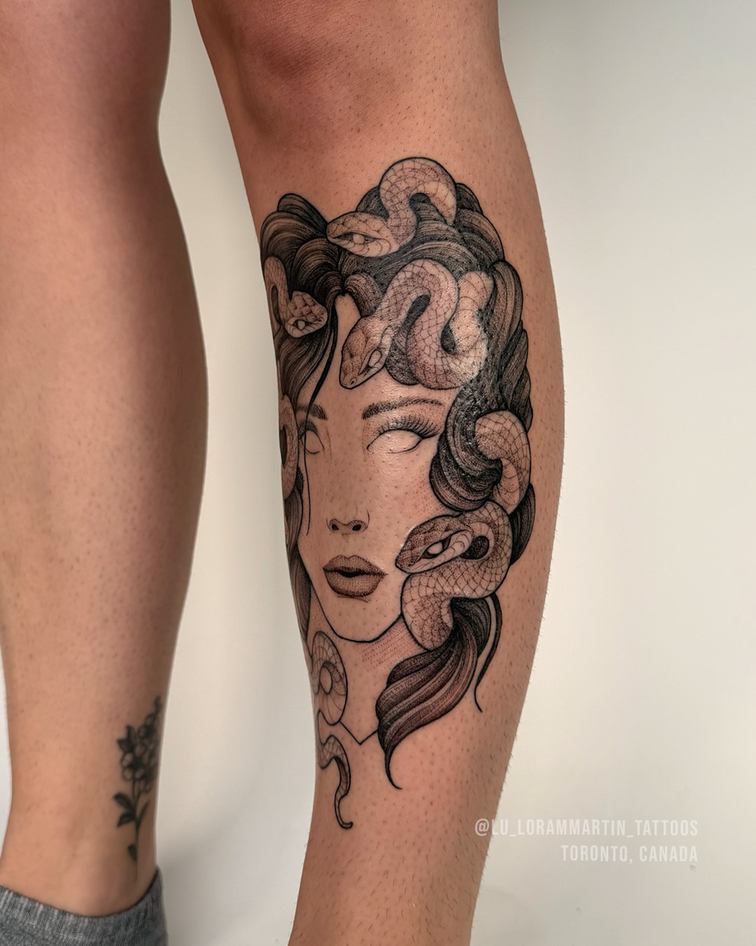 Tattoo by @lu_lorammartin_tattoos — black_and_grey, realism