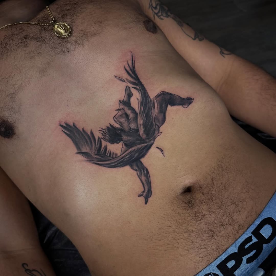 Fallen angel realism tattoo on the chest by Keags_Tattoos