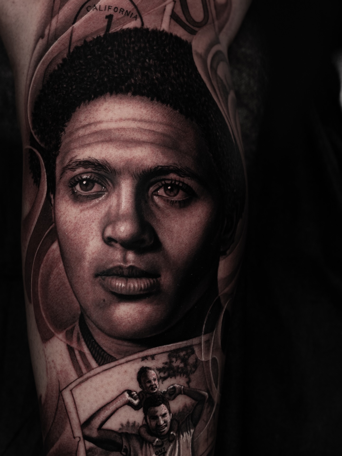 Portrait of a man and child realism tattoo on the forearm by @_garart_