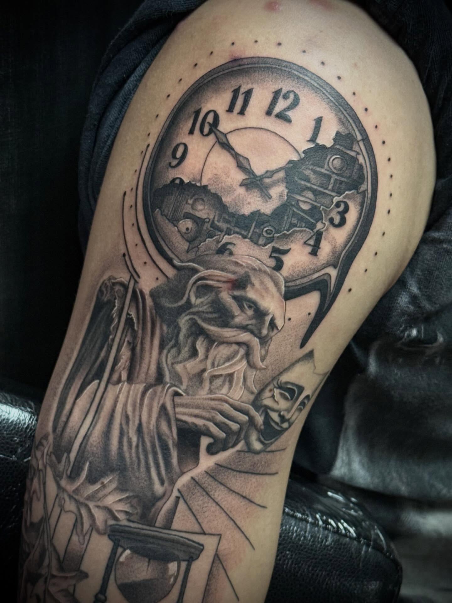 Clock and skeleton realism tattoo on the thigh by Terence Taylor