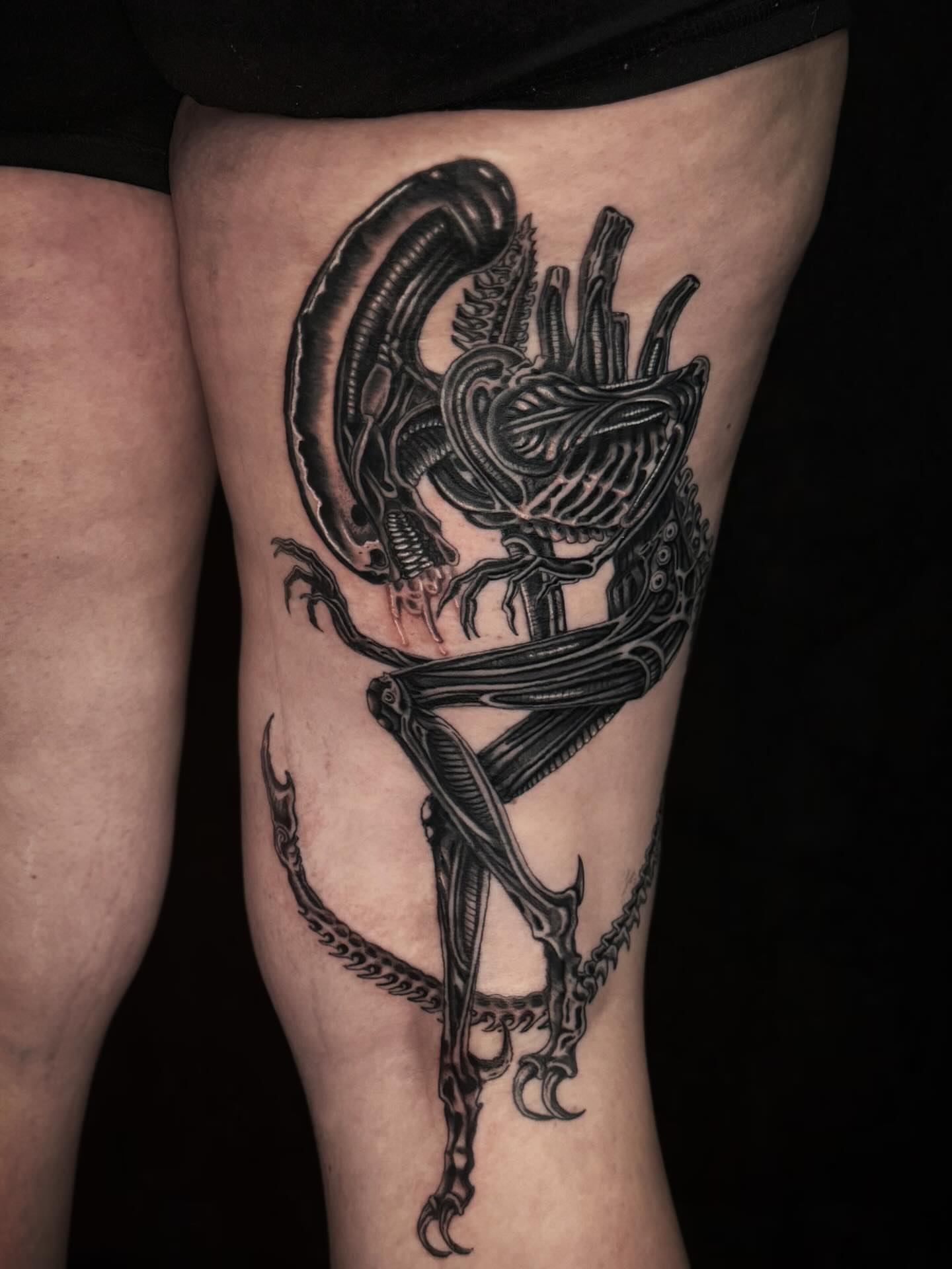 Alien xenomorph realism tattoo on the thigh by Jacie Aasen-Lupino