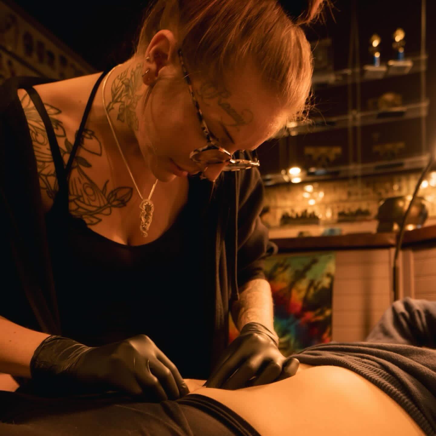 Floral design American traditional tattoo on the torso by zoie rozay hannah