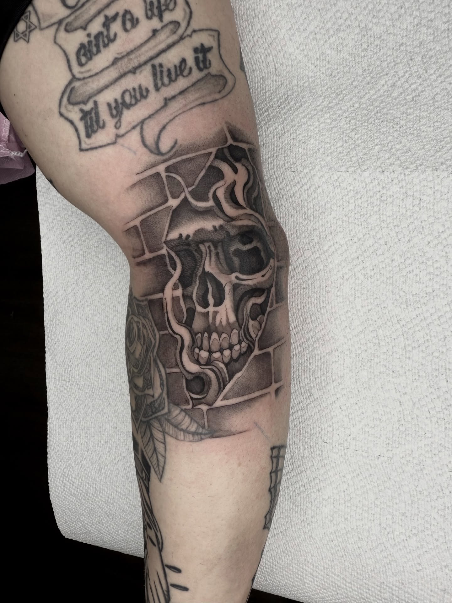 Skull realism tattoo on the forearm by Joe Weber, Monona, Wisconsin