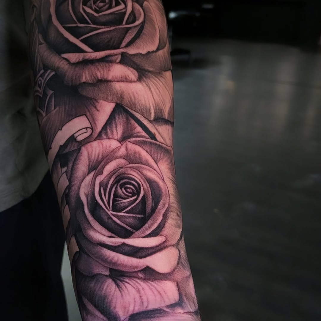Roses dotwork tattoo on the forearm by Joe Shepp