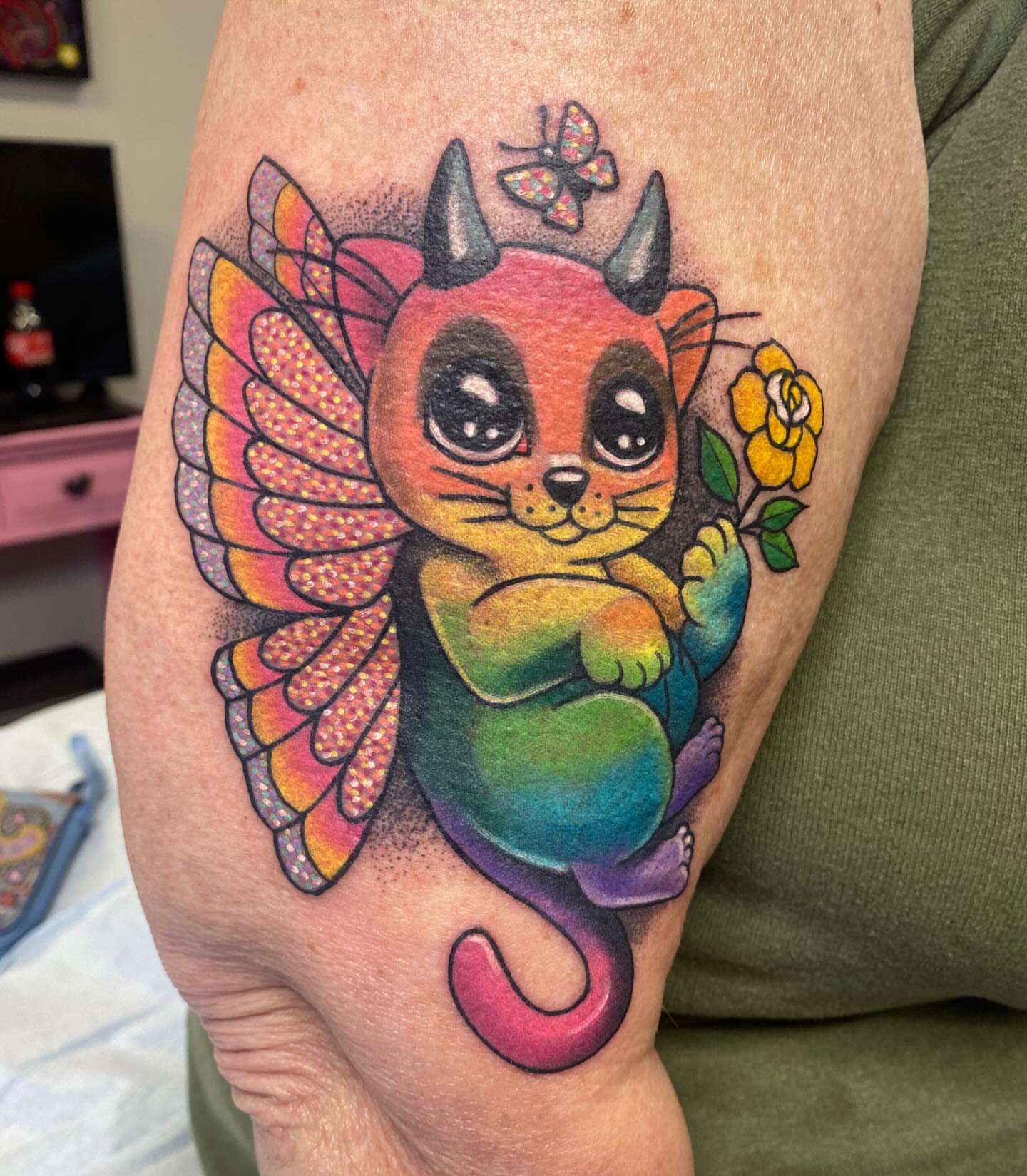 Cat with wings dotwork tattoo on the forearm by Kellsey Mull