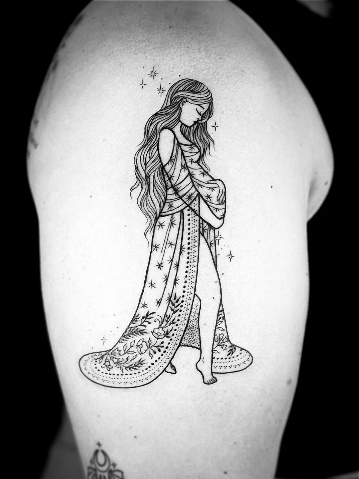 Woman in dress fine line tattoo on the shoulder by Annie Mess