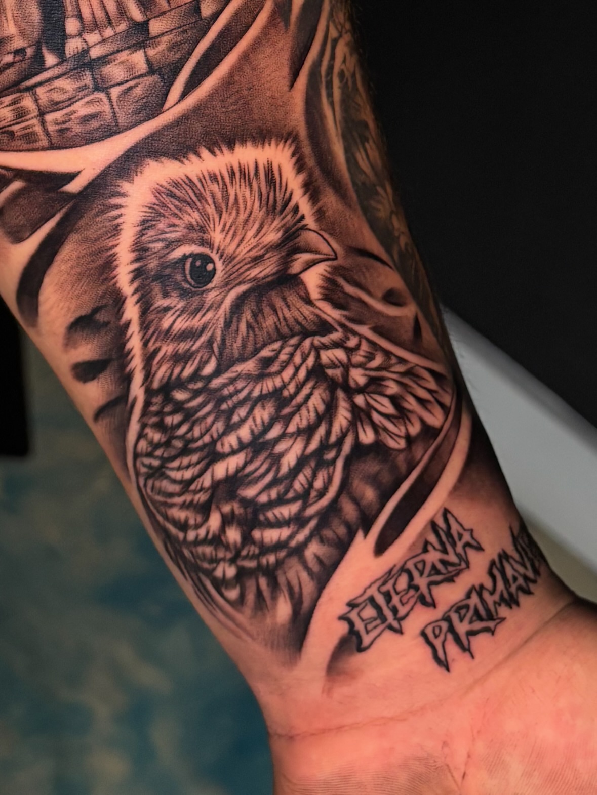 Owl realism tattoo on the forearm by Jay Daartist