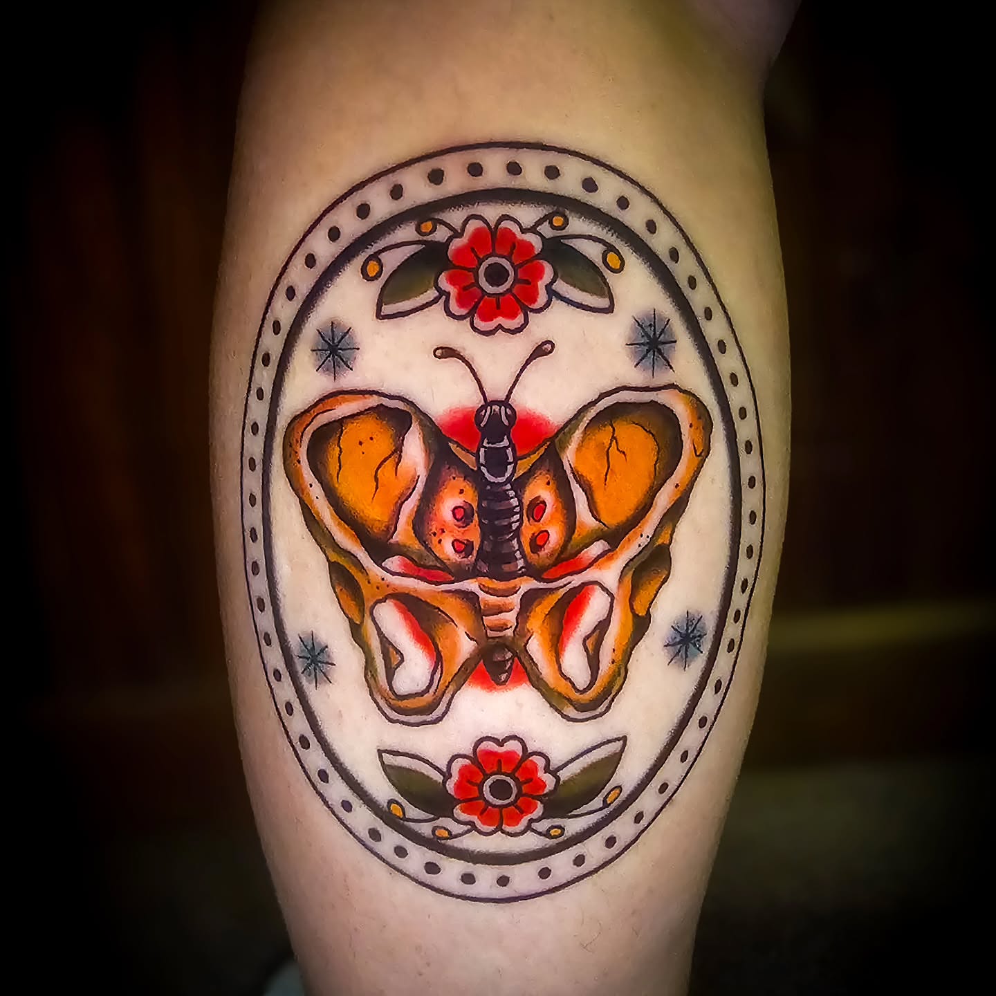 Butterfly American traditional tattoo on the forearm by Mel Michelle