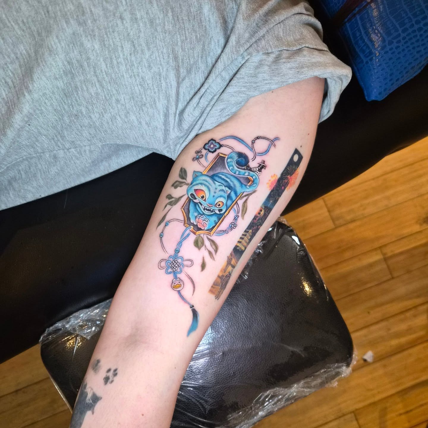 Cat and dragon new school tattoo on the forearm by Lynx, Cincinnati, Ohio
