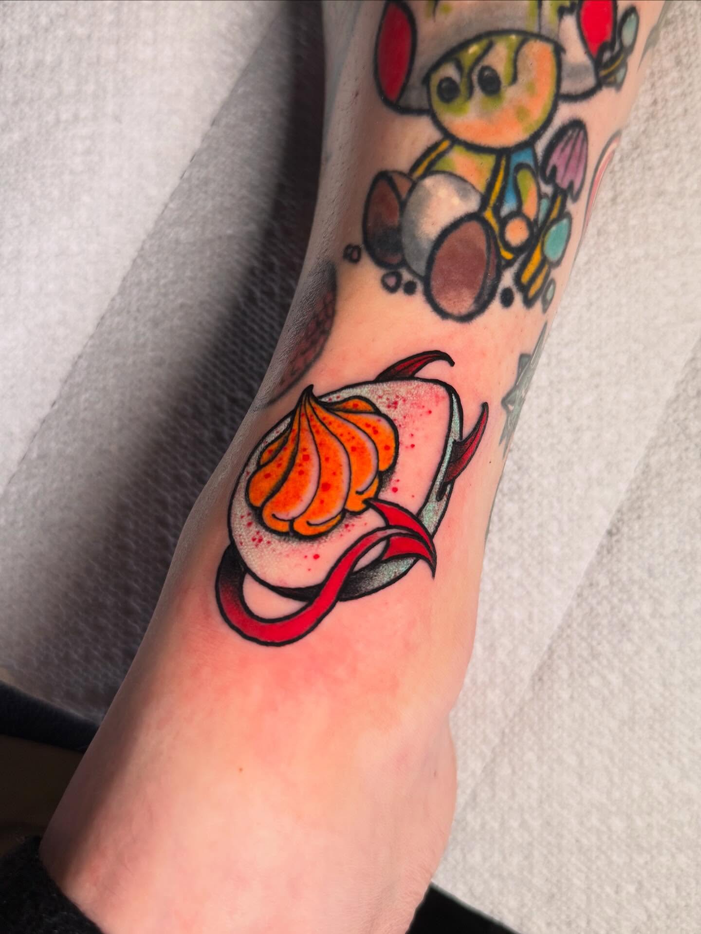 Pumpkin pie American traditional tattoo on the forearm by Jess Longfield, Des Moines, Iowa