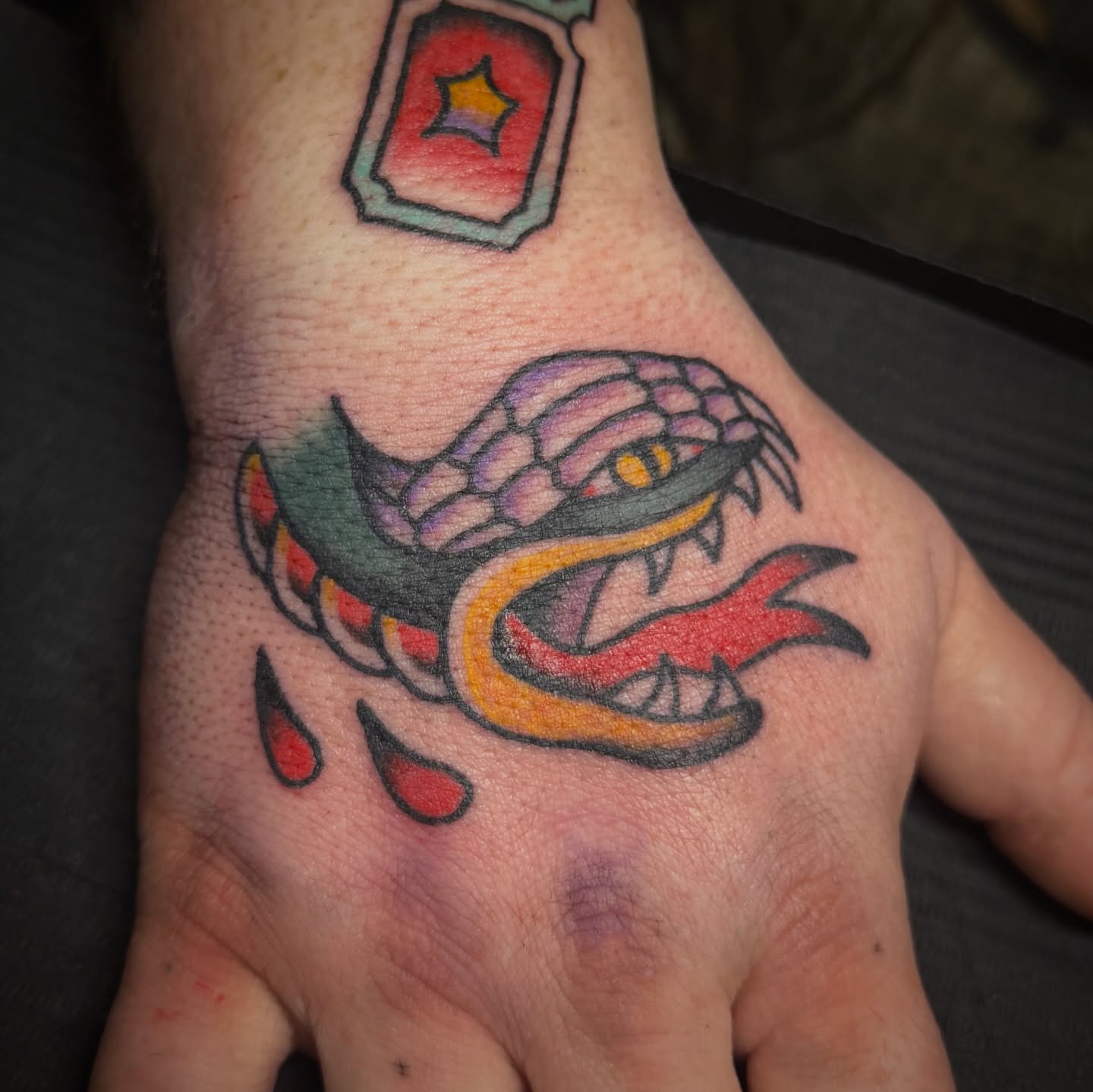 Snake American traditional tattoo on the hand by abbey pickens 🧚 cleveland ohio